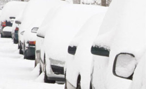 Protect your car from the elements with Heathrow undercover parking Snow-covered cars
